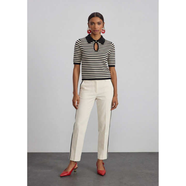 Pantalón crudo con vivos a contraste
